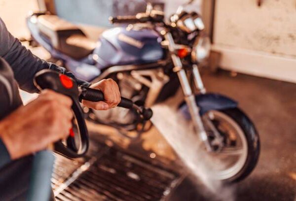 Cleaning the motorcycle, POV, close-up.