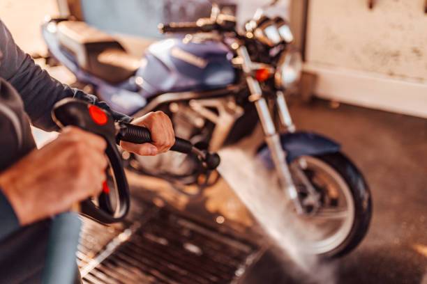 Cleaning the motorcycle, POV, close-up.